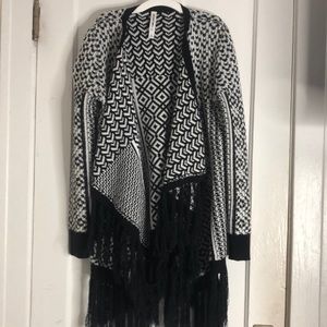 Black and white cardigan with black tassels